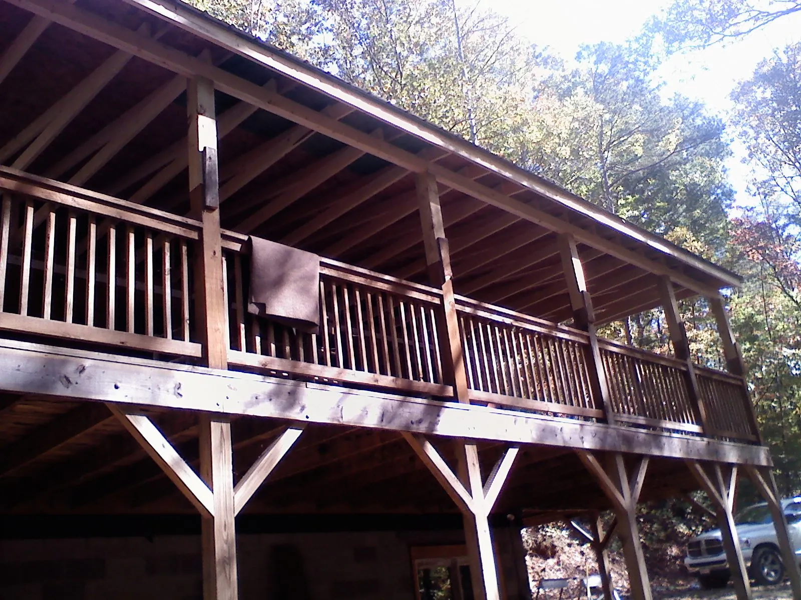 Timber framing under a new elevated porch and deck — Roof Leak Repair in Falls Church by Roofing Brothers